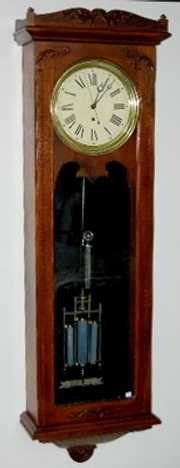 Antique Oak Pinwheel Jeweler’s Regulator Clock