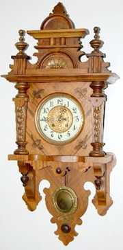 Antique Walnut Free Swinger Wall Clock