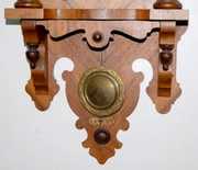 Antique Walnut Free Swinger Wall Clock