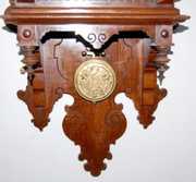 Ornate Antique Walnut Free Swinger Clock