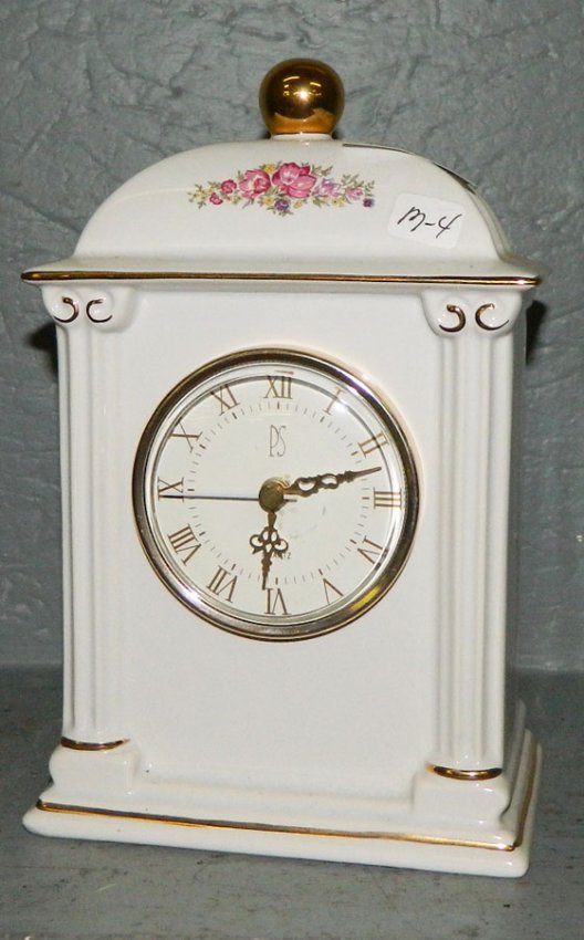 Reproduction clock. 8 12″ x 5 1/2″.