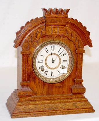 Ansonia Oak Cabinet “Tunis” Clock