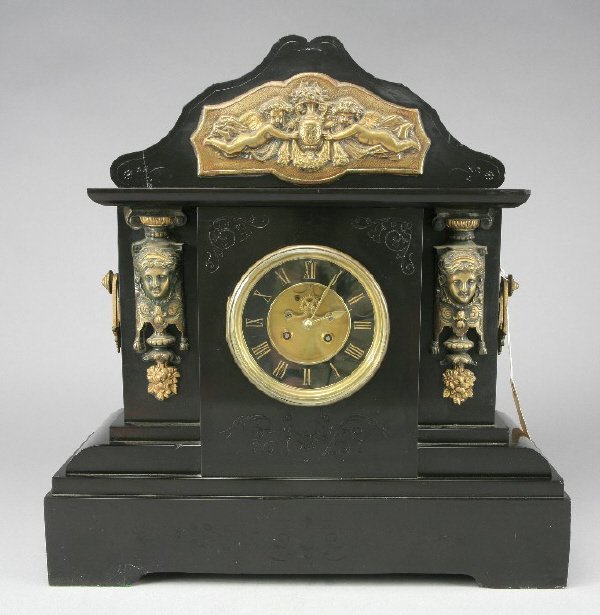 French bronze and black marble mantel clock,