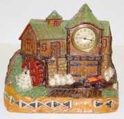 Lux Carved Figural Flour Mill Clock