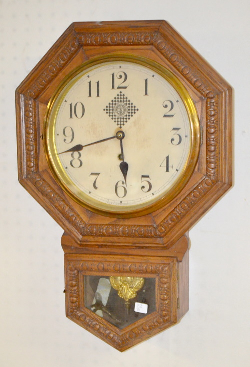 Antique Waterbury “Arion” Oak Schoolhouse Short Drop Clock