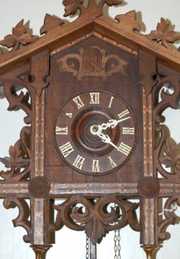 Black Forest Carved Inlaid Cuckoo Clock