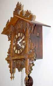 Black Forest Carved Inlaid Cuckoo Clock