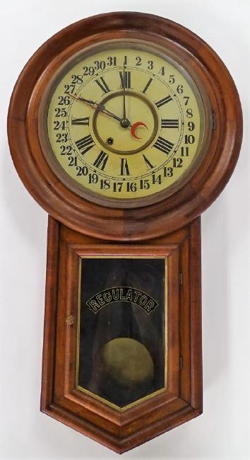 Late 19th century American calendar wall clock