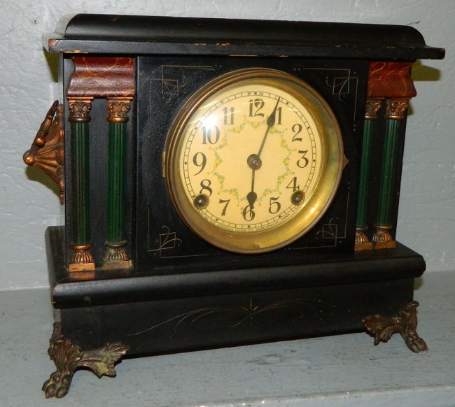 Sessions painted green clock w/ 4 columns.