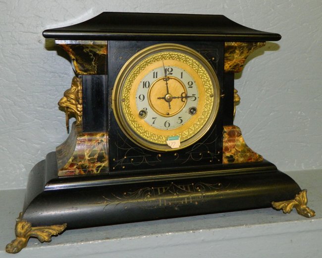 Adamantine 8 day mantle clock w/lion head detail