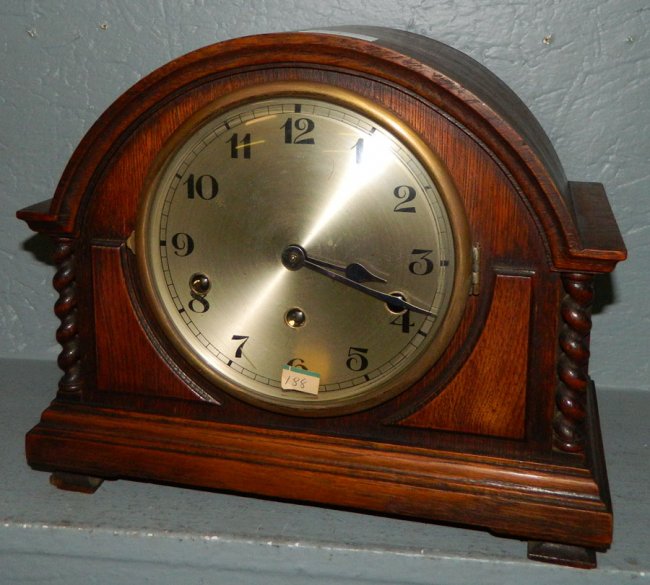 German oak 8 day clock with twist columns.