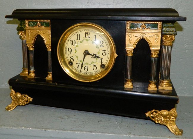 Sessions mantle clock with columns.