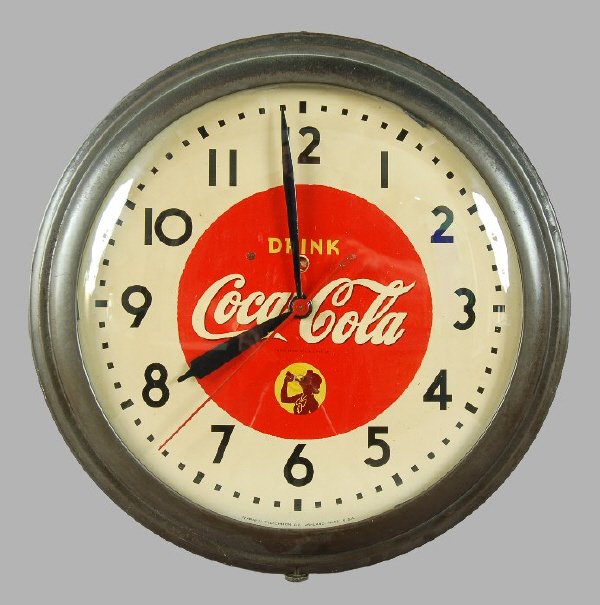 Coca-Cola round “silhouette girl” clock.