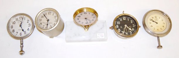 4 Automobile Clocks & 1 Other