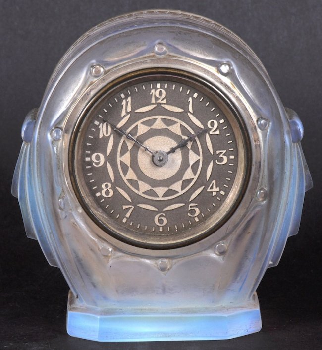 A SABINO GLASS CASED CLOCK in iridescent blue, with