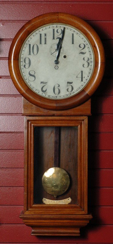 A NEW HAVEN ‘SATURN’ WALL CLOCK IN MAHOGANY CASE