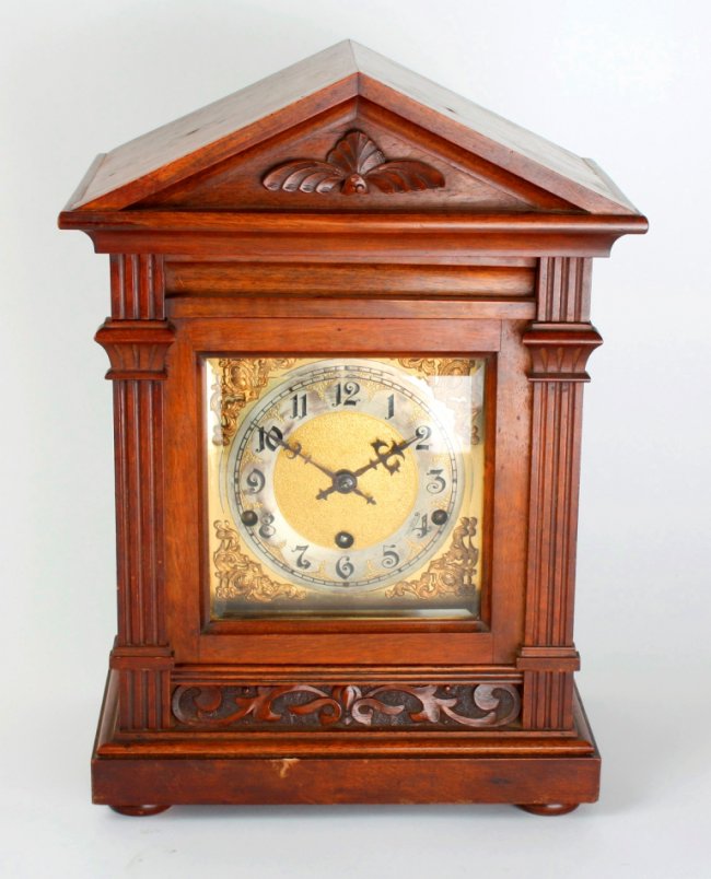 A walnut cased three-train bracket clock