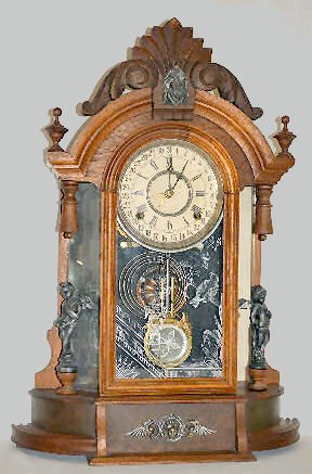 Ansonia Walnut “Triumph” Calendar Clock