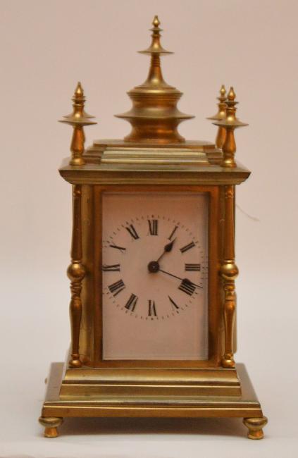 French Gilt Bronze Clock.  The white enamel dial with