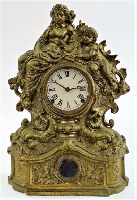 Victorian era figural Cast Iron front mantel clock