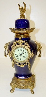 French Porcelain Urn Clock W/ Griffins