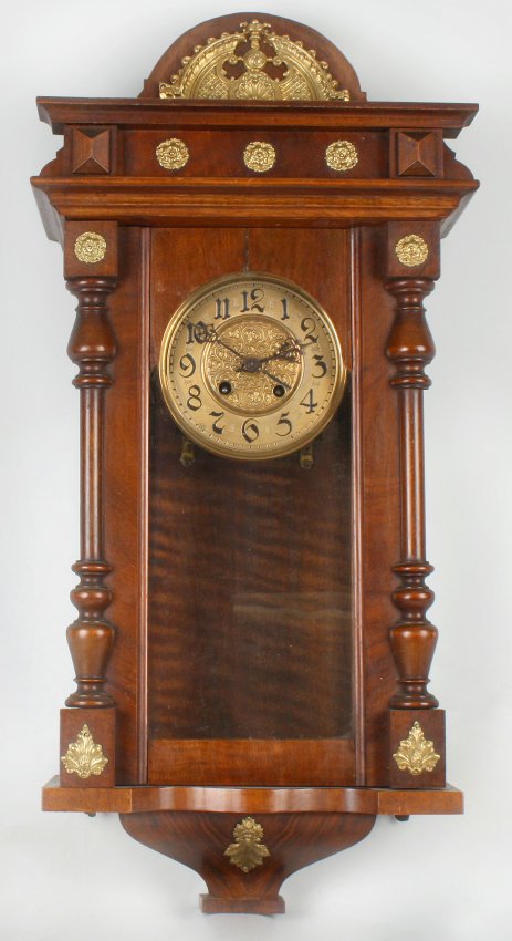 A walnut cased spring driven Vienna wall clock