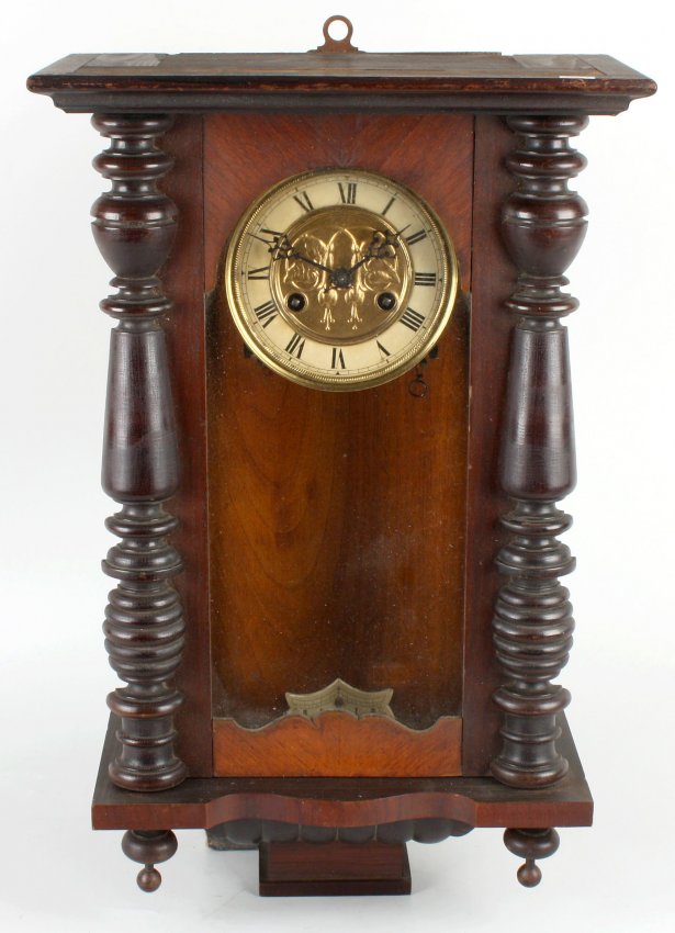 A late 19th century walnut cased Vienna wall clock