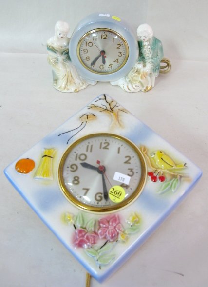 2 Sessions Pottery Cased Figural Clocks