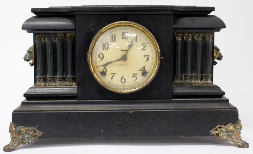 Antique black painted Iron Case mantel clock