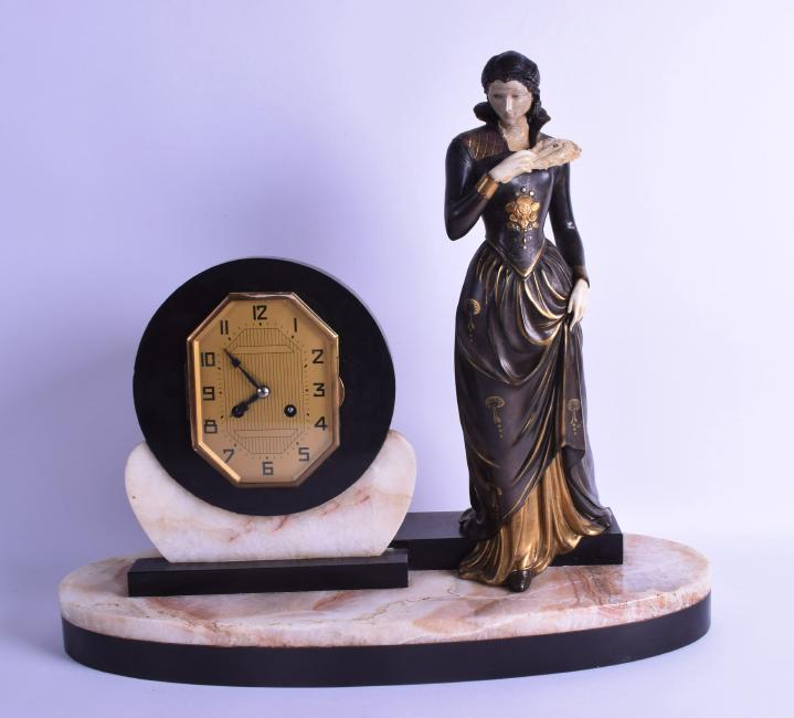 A LARGE ART DECO FRENCH MANTEL CLOCK formed as a