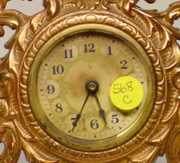 Iron Front Clock w/Cherub Head
