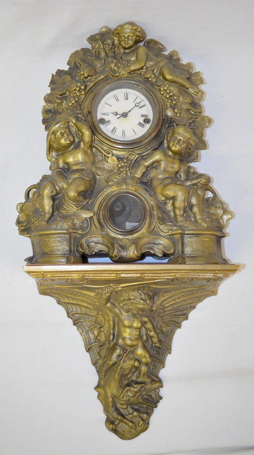 Antique Waterbury Cherub Iron Case Clock with Shelf
