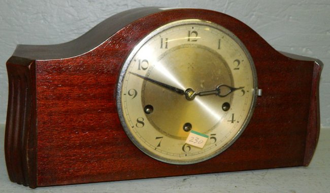 Mahogany  clock w/Continental movement.