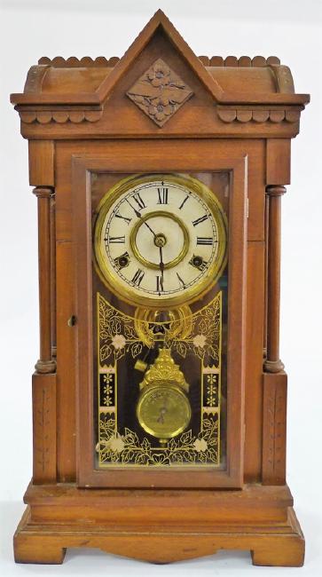 Late 19th century American carved Mahogany case shelf clock
