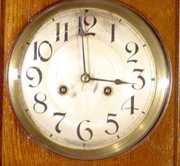 Oak Hanging Clock w/8″ Silvered Dial