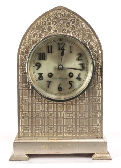A SILVERED FRENCH GOTHIC FORM CLOCK SIGNED H & H
