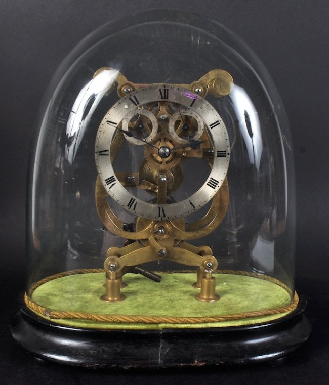 A 19TH CENTUR5Y FRENCH BRASS SKELETON CLOCK IN A GLASS