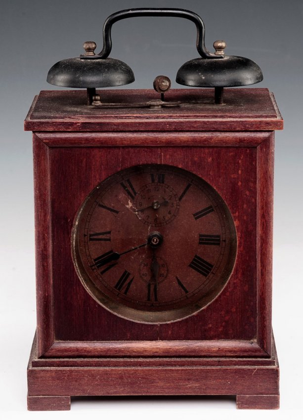 A WOOD CASE ALARM CLOCK WITH DOUBLE BRASS BELLS