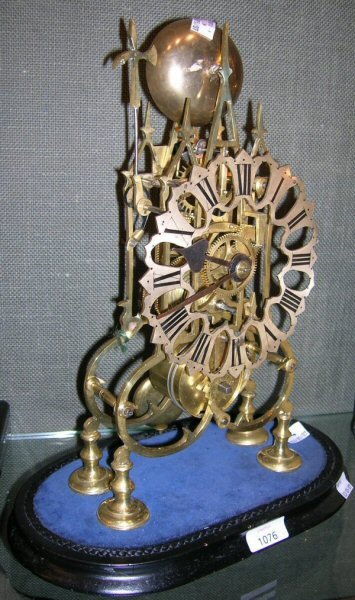 A VICTORIAN SKELETON CLOCK WITH BELL STRIKING
