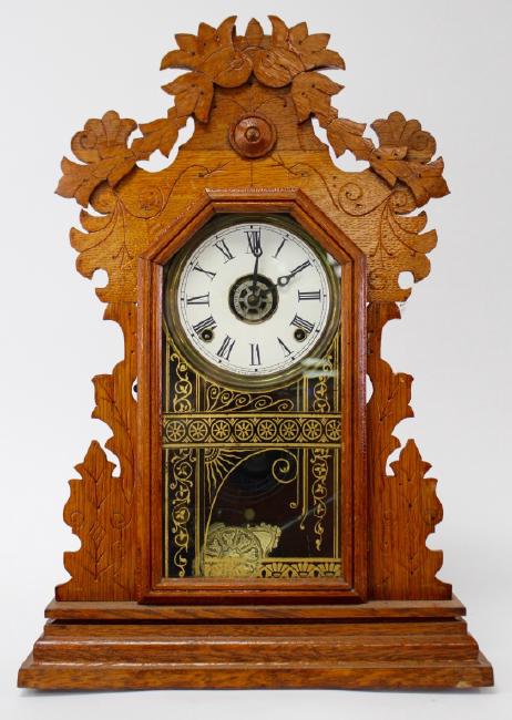 Early 20th century Oak case kitchen clock by Elias Ingraham Clock Co