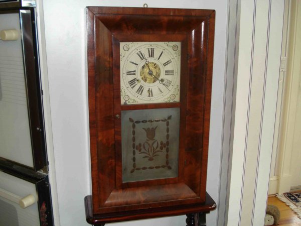 Shelf clock by Atkins and Porter
