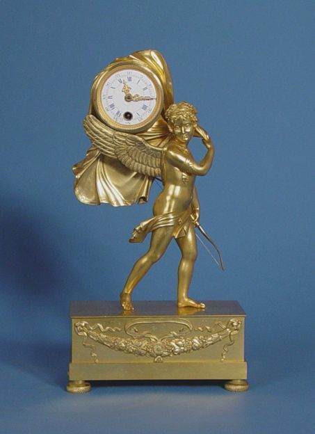 Early Dore Bronze Winged Figure Clock