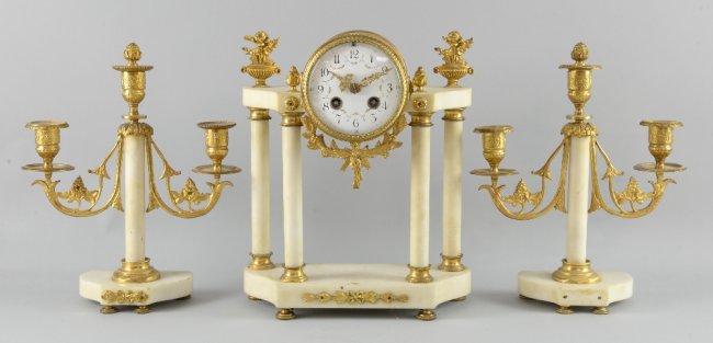 Early 20th century alabaster and gilt metal clock