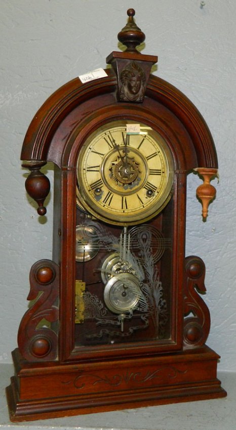 Waterbury walnut 8 day alarm teardrop clock.