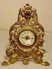 Figural Cherub & Man/Dragon Metal Desk Clock