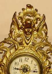 Figural Cherub & Man/Dragon Metal Desk Clock