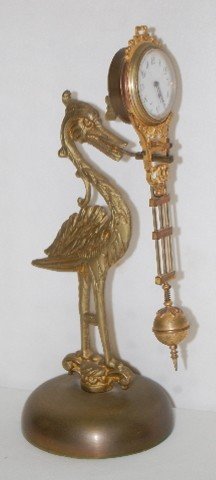 Bird Figural Swinging Clock