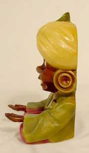 Revolving Eye Boy With Turban Novelty Clock