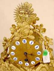 Figural Metal Sun Face Pendulum Clock