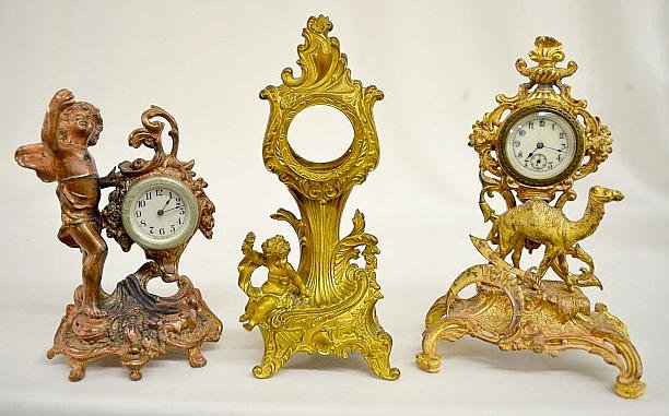 2 Novelty Clocks, Cherub, Camel & 1 Cherub Case Only